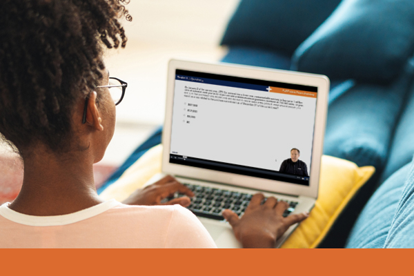 Woman looking at a computer, working.