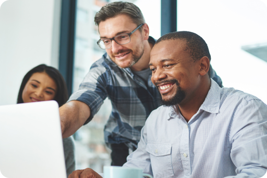 workers looking at laptop