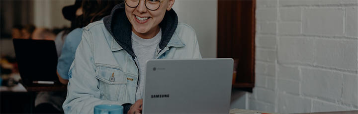 Student with a laptop in a coffee shop