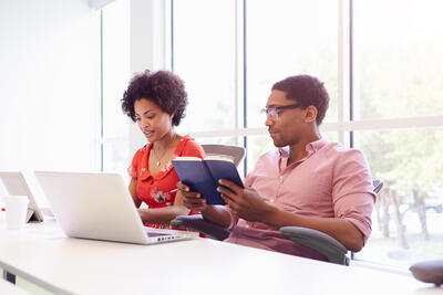 Man and woman studying together for CPA exam