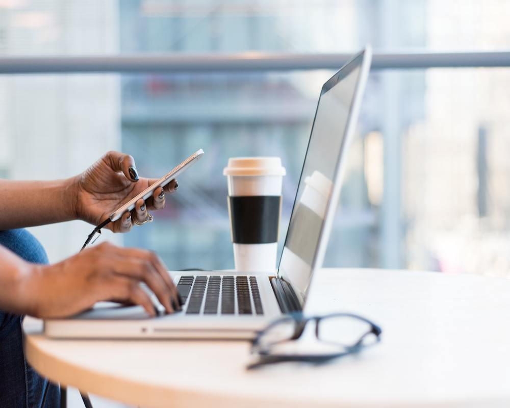 woman typing on computer