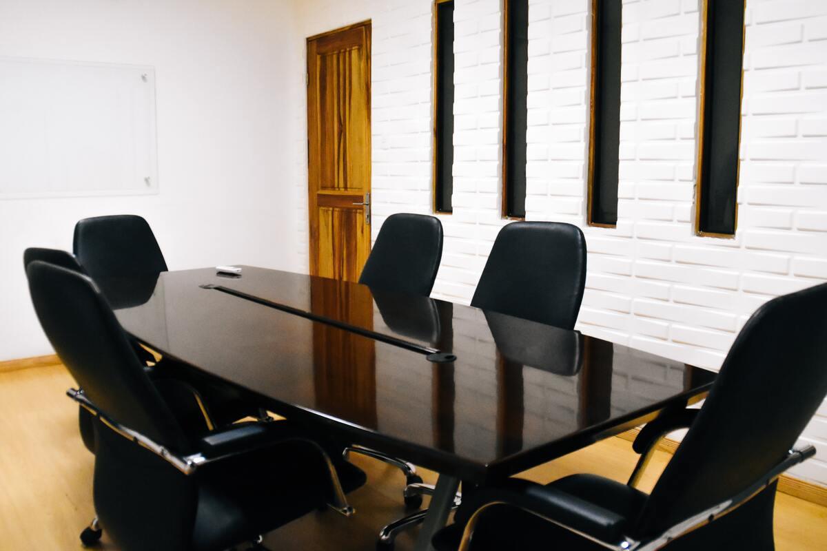 Chairs surrounding a meeting table
