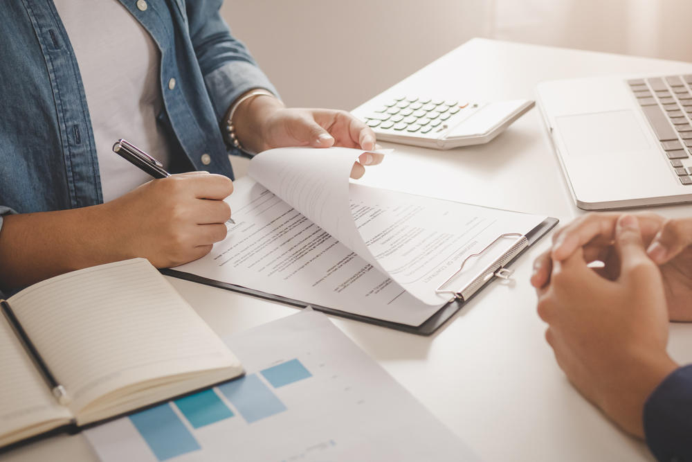 two business people reviewing a contract