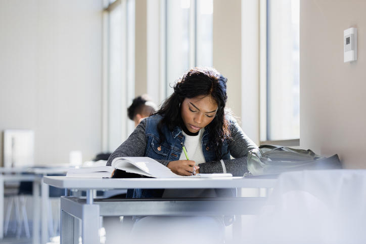 person studying in a library