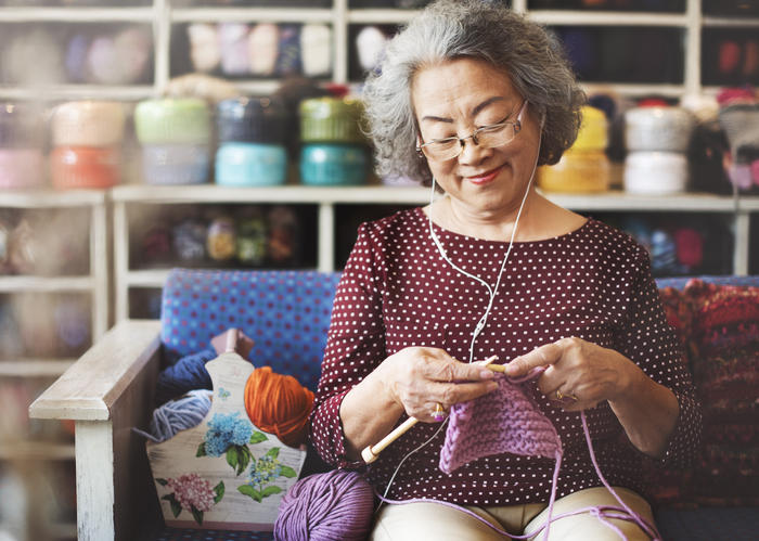 person knitting