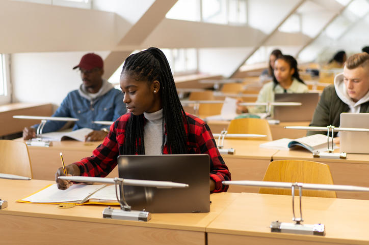 college students sitting in classroom studying
