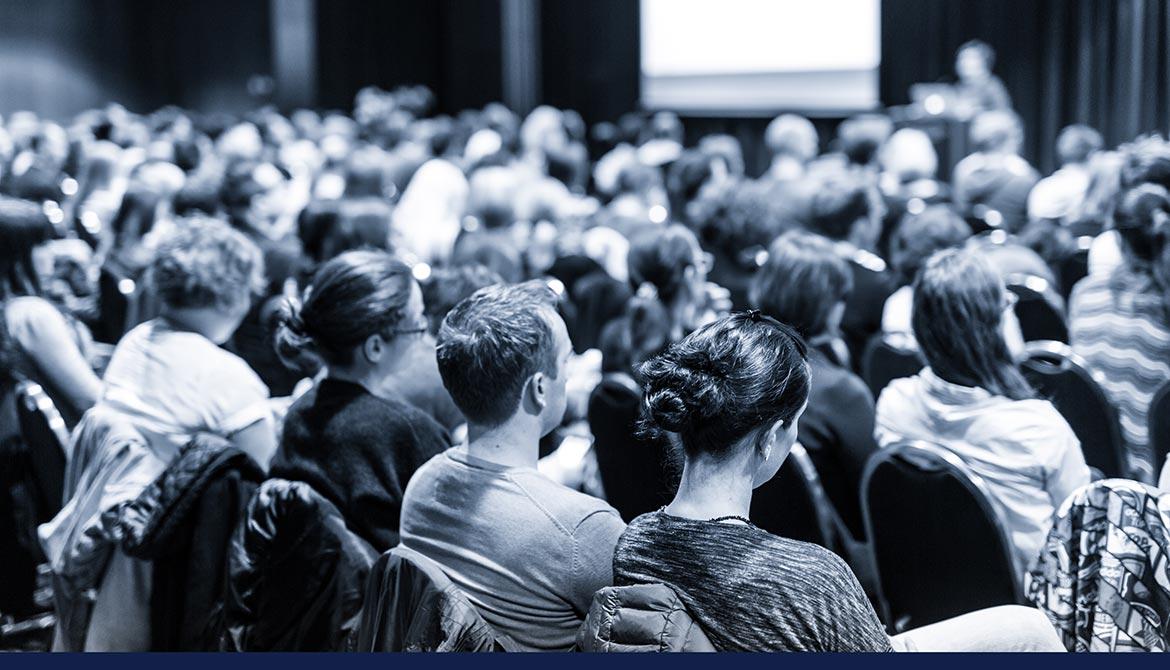 Audience cheers for new speaker