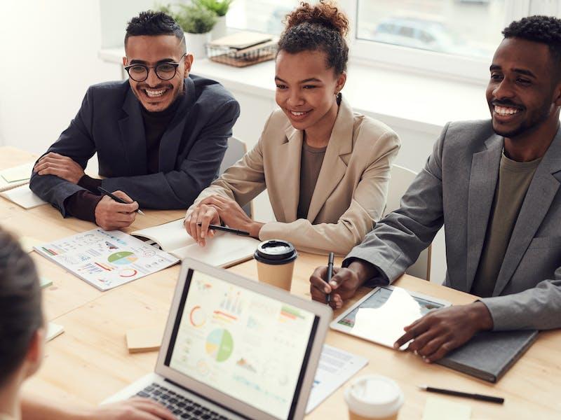 Board meeting with young accountants