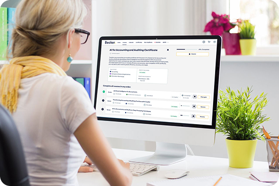 woman looking at computer screen