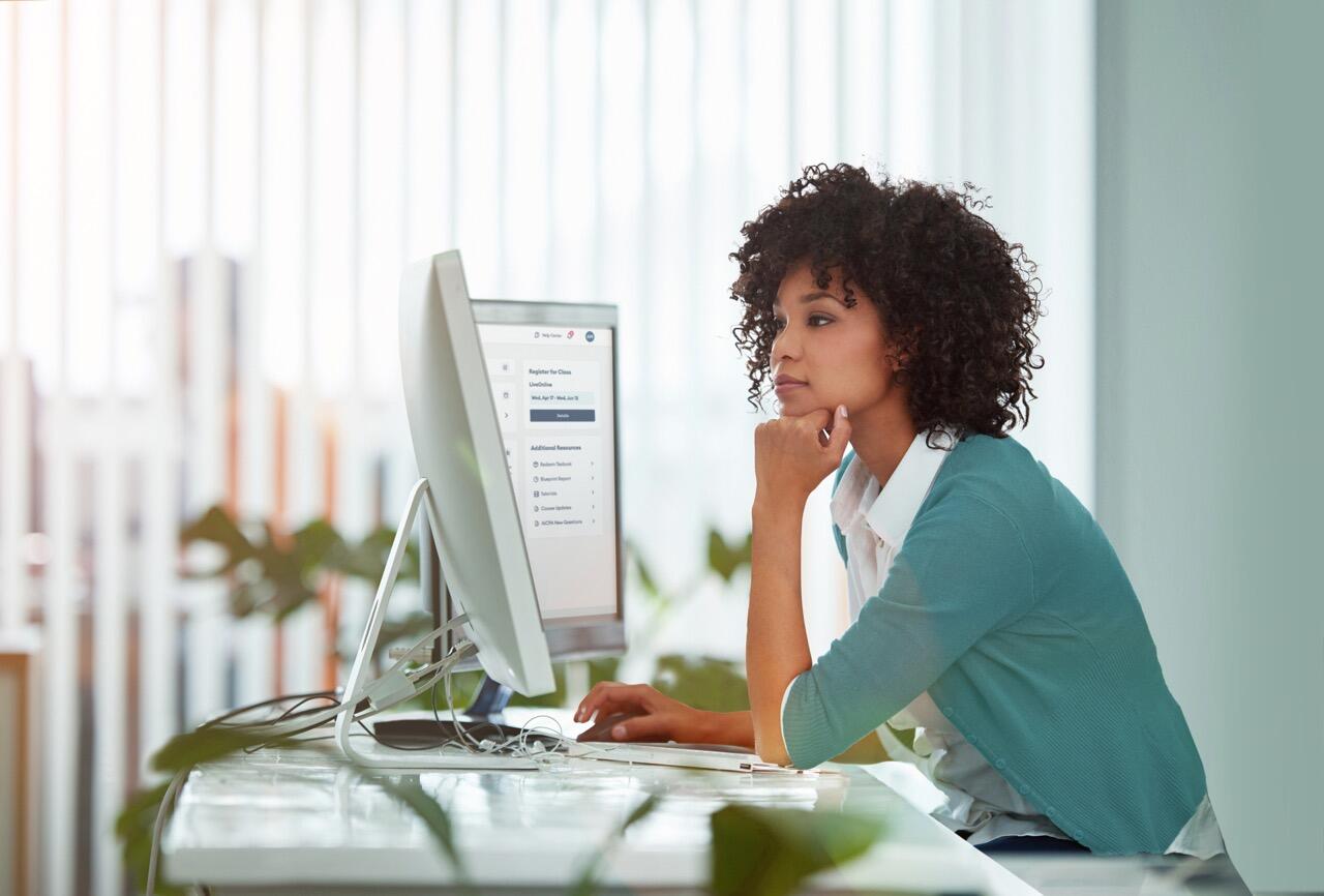 woman at a desktop computer